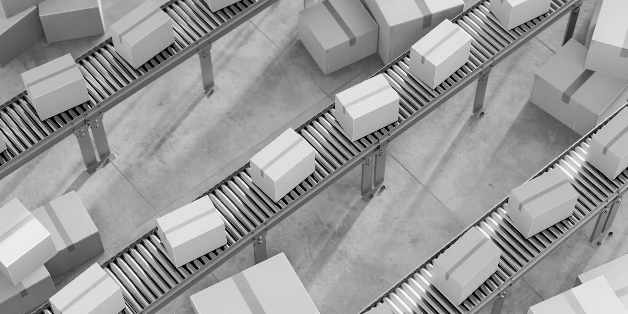 Aerial view of parcels moving along parallel conveyor lines
