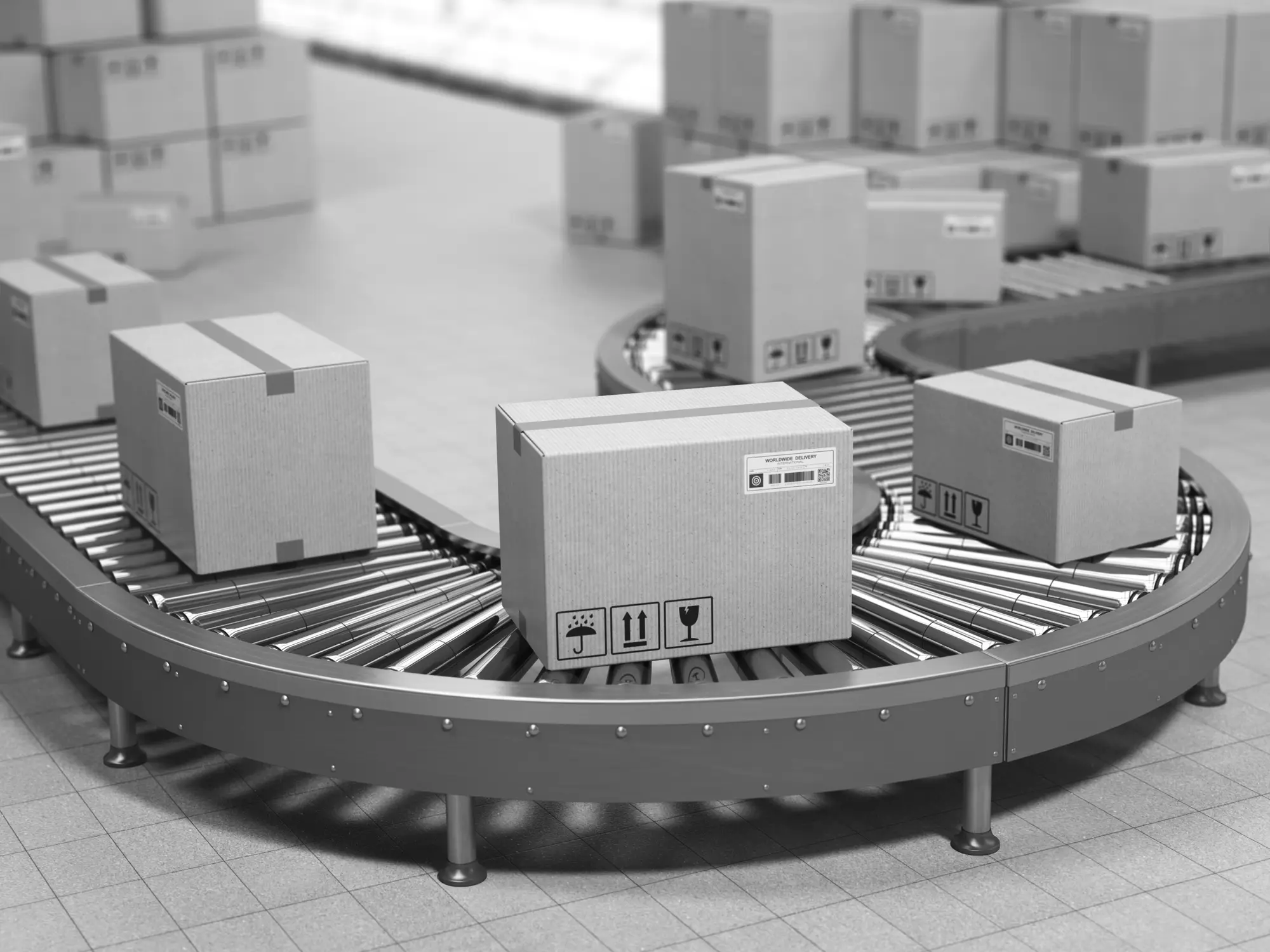 Cartons rounding a curve on a roller conveyor