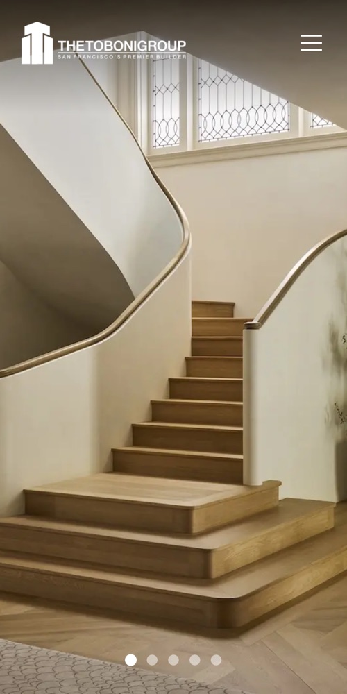 The Toboni Group site on mobile — the staircase photograph filling the entire screen